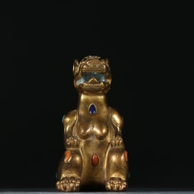A Qing Dynasty copper gilt beast ornament