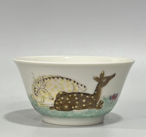 A Qing Dynasty Yongzheng pastel double deer pattern horseshoe cup