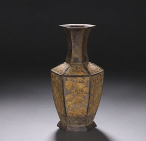 A Tang Dynasty silver-gilt floral pattern hexagonal bottle