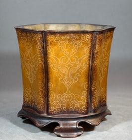 A Qing Dynasty silver silk pen holder