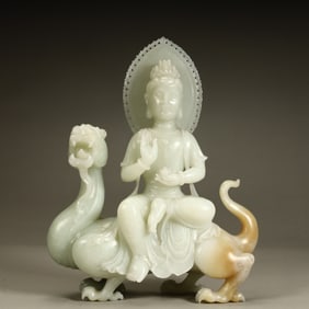 A Qing Dynasty Hetian white jade Guanyin ornament