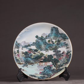 A Qing Dynasty Yongzheng pastel landscape pavilion figure plate