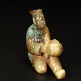 A Han Dynasty jade music figurine