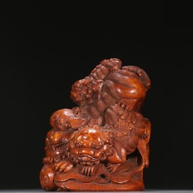 A Qing Dynasty bamboo carved lioness ornament