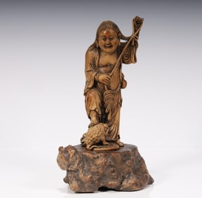 A piece of agarwood carved bangs play golden toad