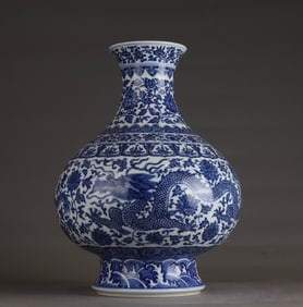 A Qing Dynasty Qianlong blue and white entwined lotus dragon pattern vase