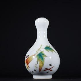 A Qing Dynasty Yongzheng enamel garlic bottle