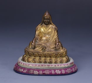 A Qing Dynasty Tibetan bronze gilt statue of Tsongkhapa