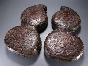 A pair of Qing Dynasty Qianlong agarwood "auspicious celebration every year" carved imperial poem