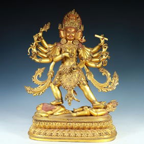 A bronze gilt ten-armed Buddha statue of the Qing Dynasty