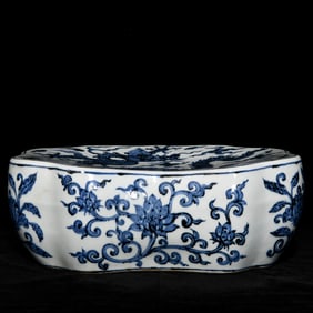 A bright blue and white dragon pattern pillow