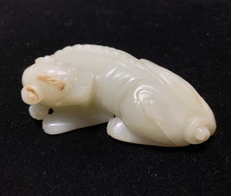 A piece of Qing Dynasty Hetian jade beast handle weighs 230g