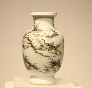 A Qing Dynasty ink color reed goose appreciation bottle