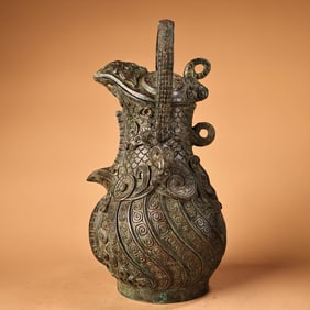 A bronze beam bird pot