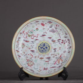 A Qing Dynasty Jiaqing pastel eight-treasure longevity plate