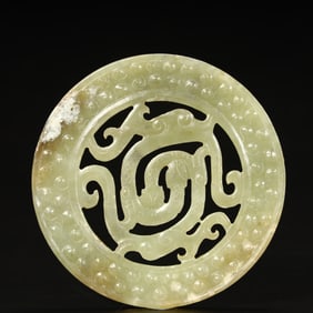 A Han Dynasty hollow dragon valley pattern jade