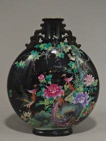 A Qing Dynasty Yongzheng year enamel color black background phoenix wearing peony pattern binaural