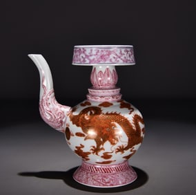 A Qing Dynasty Qianlong alum red gold-painted dragon pattern Benba pot