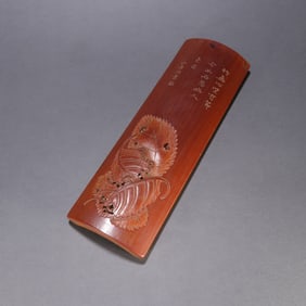 A Qing Dynasty bamboo carved leaf insect pattern armrest