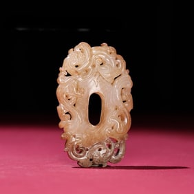 A Han Dynasty white jade birth pit dragon chicken core pendant