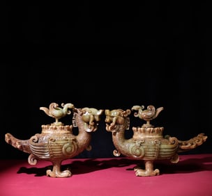 A pair of Han Dynasty pit full of phoenix bird utensils