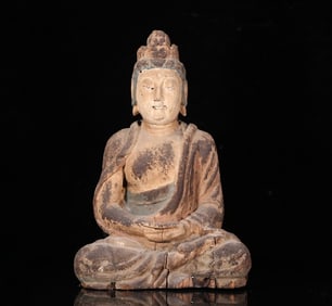 An old nanmu Guanyin statue