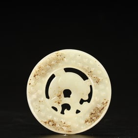 A Han Dynasty hollow dragon valley pattern jade