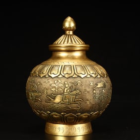 A copper-gilt engraved hunting pattern lid jar