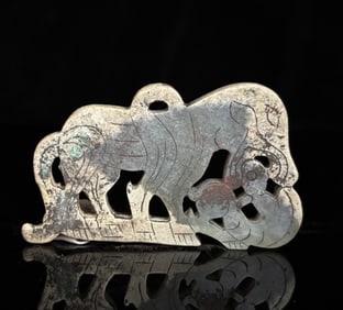 A Han Dynasty jade yin carved line auspicious beast pendant