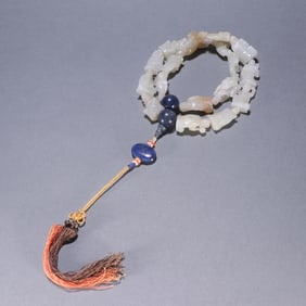 A piece of Hetian jade eighteen arhats held