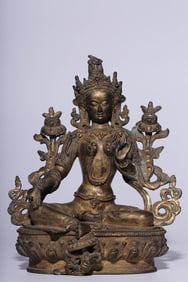 A seated statue of Tara in bronze gilt green of the Republic of China