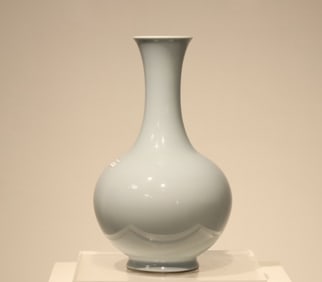 A Qing Dynasty Qianlong sky blue glaze skimming vase - auction collection