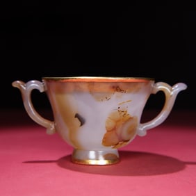 A Qing Dynasty agate gold-clad cup