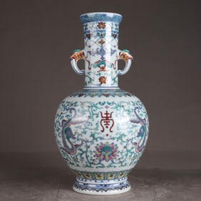 A Qing Dynasty Qianlong blue and white Doucai Fushou dragon pattern amphora