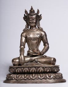 A seated statue of the Buddha in the Qing Dynasty with copper gilt silver