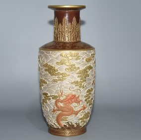 A Qing Dynasty carved seawater silver land dragon godson