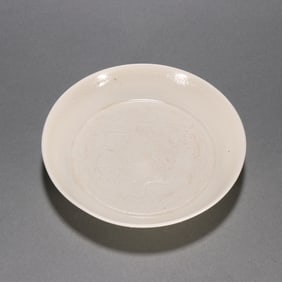 A Liao Ding kiln carved flower plate