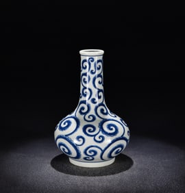 A Ming Chenghua blue and white curly grass pattern straight neck bottle