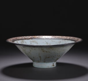 A shadow celadon wrapped silver mouth with a secretly engraved flower hat bowl