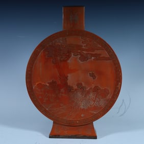 A Qing Dynasty bamboo reed carved pine tree moon bottle