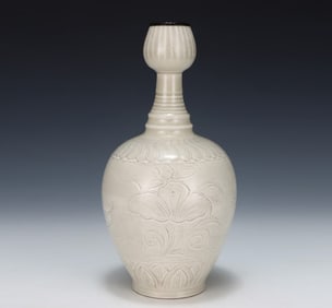 A Song Ding kiln carved garlic head bottle