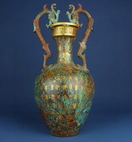 A Han Dynasty bronze gold double dragon vase