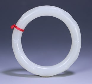 A Hetian jade double lion bracelet