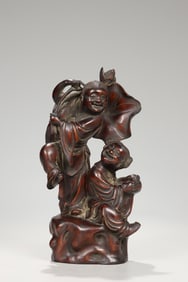 A Qing Dynasty boxwood carving and box two immortal ornaments