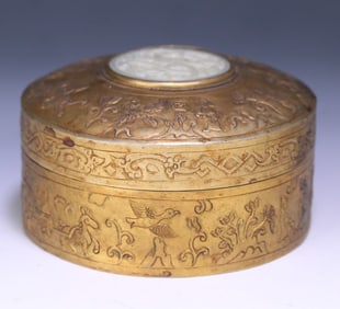 A copper gilt inlaid Hetian jade figure beast and bird pattern lid box