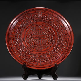A Qing Dynasty rhinoceros lacquer five-blessing longevity pattern appreciation plate