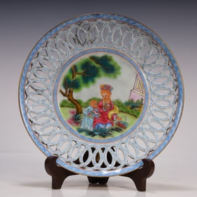 A Qing Dynasty Qianlong blue material hollow plate