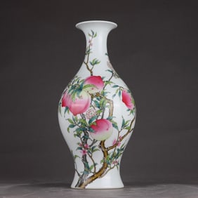 A Qing Dynasty Yongzheng pastel eight-peach olive bottle