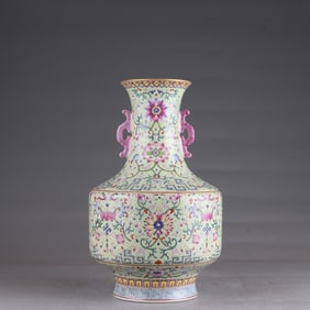 A Qing Dynasty Qianlong apple green field pastel entwined lotus amphora