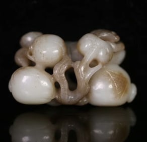 A Qing Dynasty Hetian jade three carvings